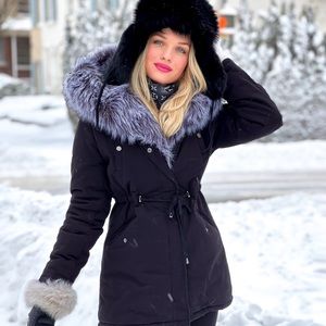 Winter coat. Faux fur. Black with white collar.